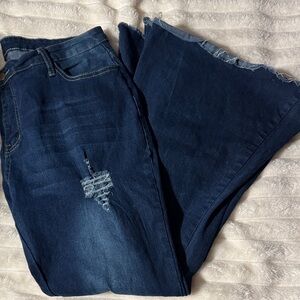 Dark Blue Flare Jeans with Distressed Accents